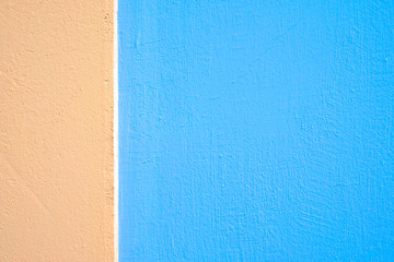 Fototapeta premium Bright pink coral and light blue color bands, wall graphic background element.