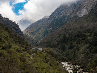 Fototapeta na wymiar Nepal Mountain Valley, Teahouse Along River, Annapurna Trek