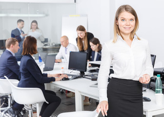 business woman is standing  in coworking space