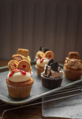 Baking tray of decorated cupcakes