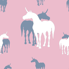 seamless background of silhouettes of unicorns on colored background