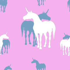 seamless background of silhouettes of unicorns on colored background