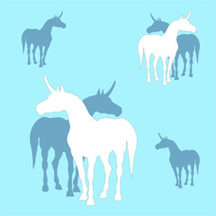 vector isolated silhouettes of unicorns on colored background