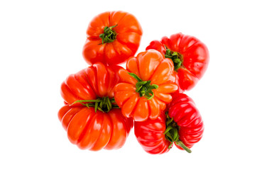Red fresh beefsteak tomatoes on white background.