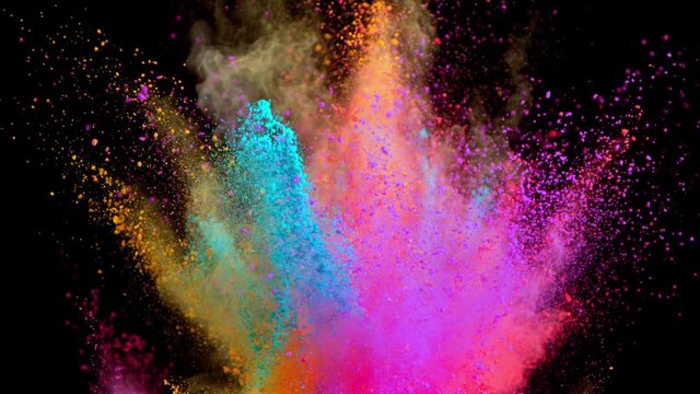 Super Slow Motion Shot of Color Powder Explosion Isolated on Black Background at 1000fps. Shooted with High Speed Cinema Camera at 4K.