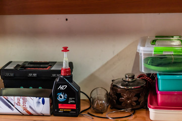 a cute tinker shelf - there is tool box and grease