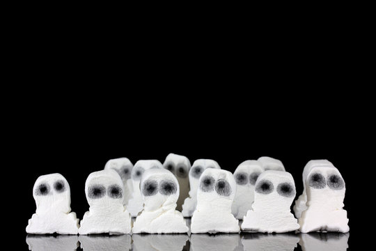 Halloween ghost sweets in a group