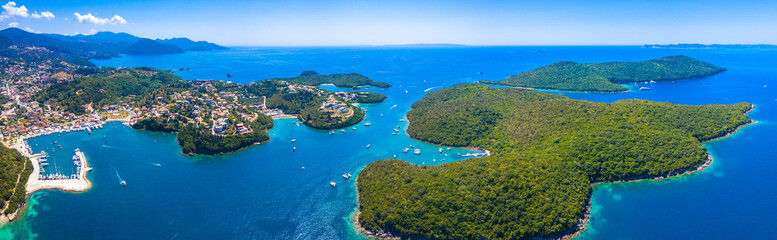 Aerial view of iconic paradise sandy beaches with turquoise sea in complex islands of Agios...