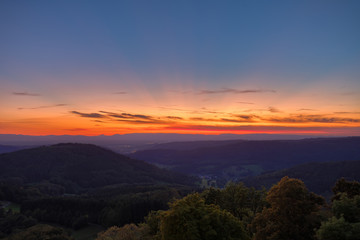 Obraz premium View over some Black Forest hills from the castle Hohengeroldseck on the evening sunset