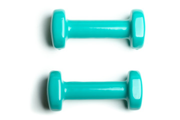 Two dumbbells isolated on white background. Concept Gym Lifestyle 