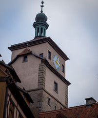 Fototapeta na wymiar Clock tower in rothenburg ob der tauber Germany