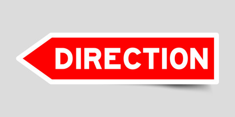Label sticker in red color arrow shape as word direction on white background