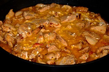 stew in cream sauce in a frying pan