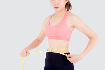 Beautiful slim young asian woman measuring tape thin waist wear uniform fitness isolated white...