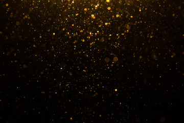Fototapeta na wymiar Abstract gold bokeh with black