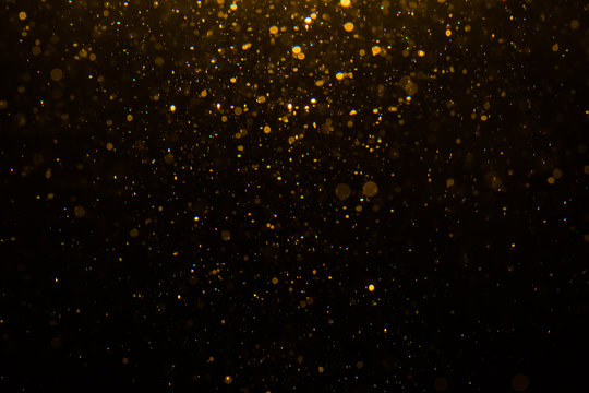 Abstract gold bokeh with black