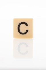 Alphabet C word block with white background.