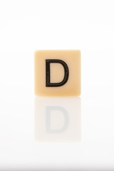 Alphabet D word block with white background.