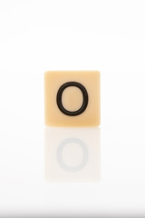 Alphabet O word block with white background.