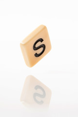 Alphabet S word block with white background.