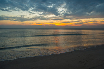 Fototapeta na wymiar Siluette sunset at the beach background