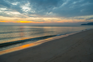 Siluette sunset at the beach background