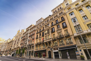 Madrid Spain, city skyline at the famous Gran Via shopping street