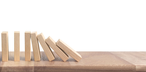 Hand stopping  Domino effect stopped by unique