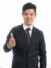 Portrait of Asian business man with thumb up..