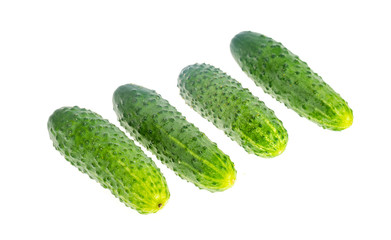 Bunch of fresh green cucumbers isolated on white background