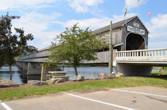 Summer In New Brunswick: Hartland Covered Bridge Over The Saint John River