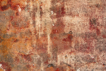 Texture of a concrete wall with cracks and scratches which can be used as a background
