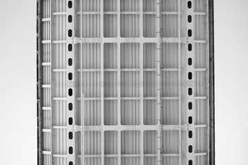 Road bridge against the sky view from below black and white image.