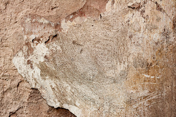 Texture of a concrete wall with cracks and scratches which can be used as a background