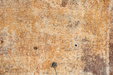 Texture of a concrete wall with cracks and scratches which can be used as a background