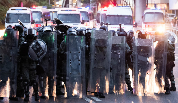 Hong Kong Police waiting to advance on protestors
