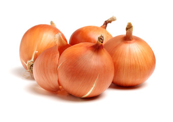 Gold onion vegetable bulbs on white background