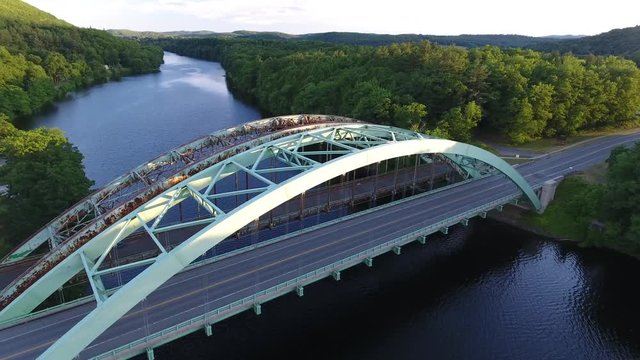 Green Steel Arch Bridges between New Hampshire and Vermont over Connecticut River Aerial Footage