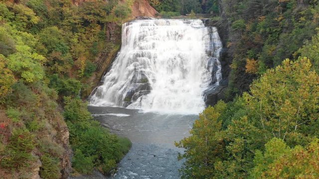 Cinematic aerial video of powerful Ithaca Falls waterfall cascade in Upstate, New York