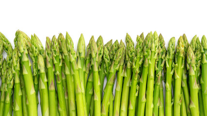 Green asparagus on a white background.