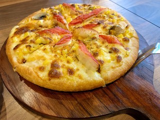 pizza on the wooden table