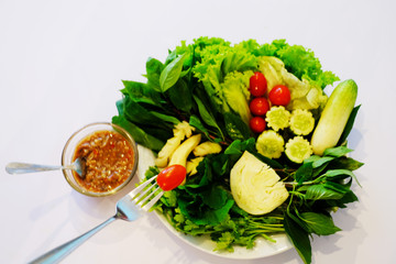 Vegetable and shrimp-paste sauce on white background