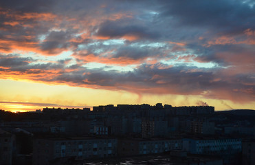 Silhouette City Sunset with clouds in Murmansk Russia with dramatic red, blue and ornage sky