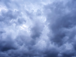 Fototapeta premium It is going to rain.Many white clouds in the sky.Should carry a stick umbrella. Imagine a picture of a cloud looking like a haze