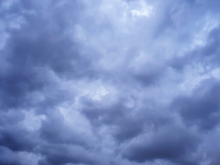 It is going to rain.Many white clouds in the sky.Should carry a stick umbrella. Imagine a picture of a cloud looking like a haze