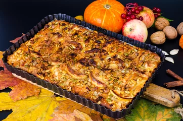 Foto op Plexiglas Homemade apple pie with nuts and pumpkin seeds. © ArtCookStudio
