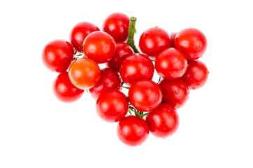 Bunch of ripe red cherry tomatoes isolated on white background.