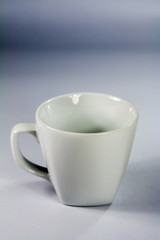 white cup on background