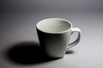 white cup on background