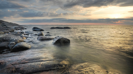 Fototapeta na wymiar Sunset at sea in Finland.